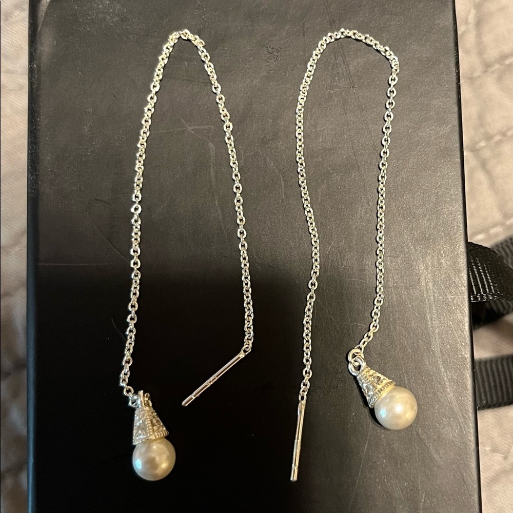 Silver tone chain earrings with pearl-like stone